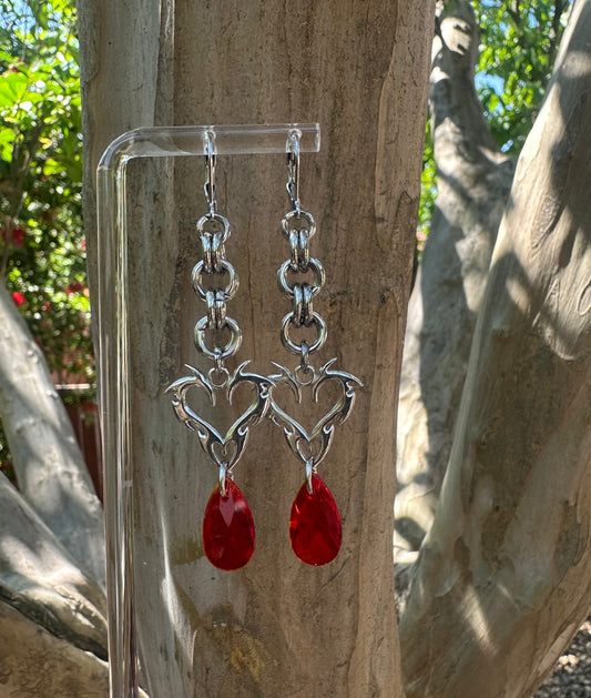 Heart bleed earrings